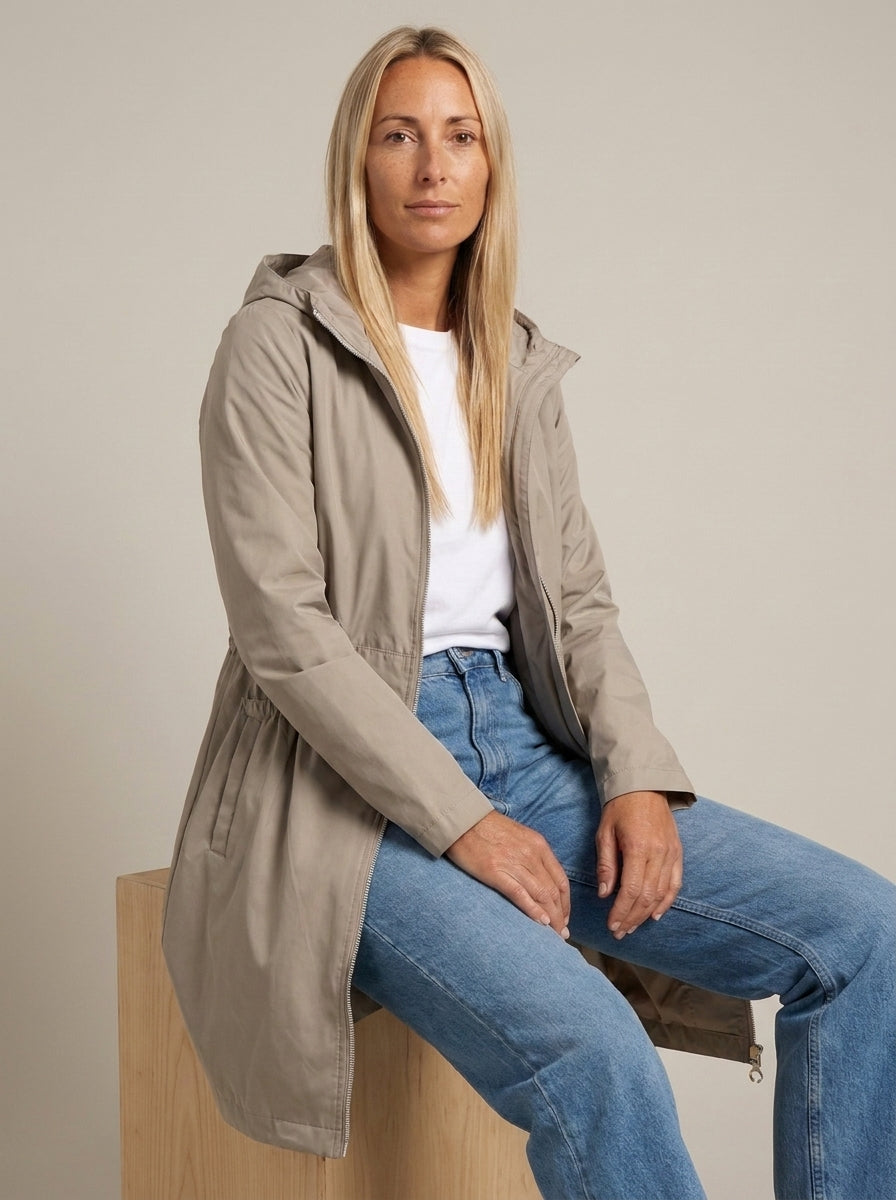 dipni womens waterproof trench coat beige seated 08