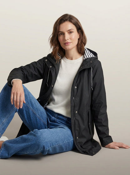 dipni womens waterproof windproof hooded jacket row50 05 black sitting on floor