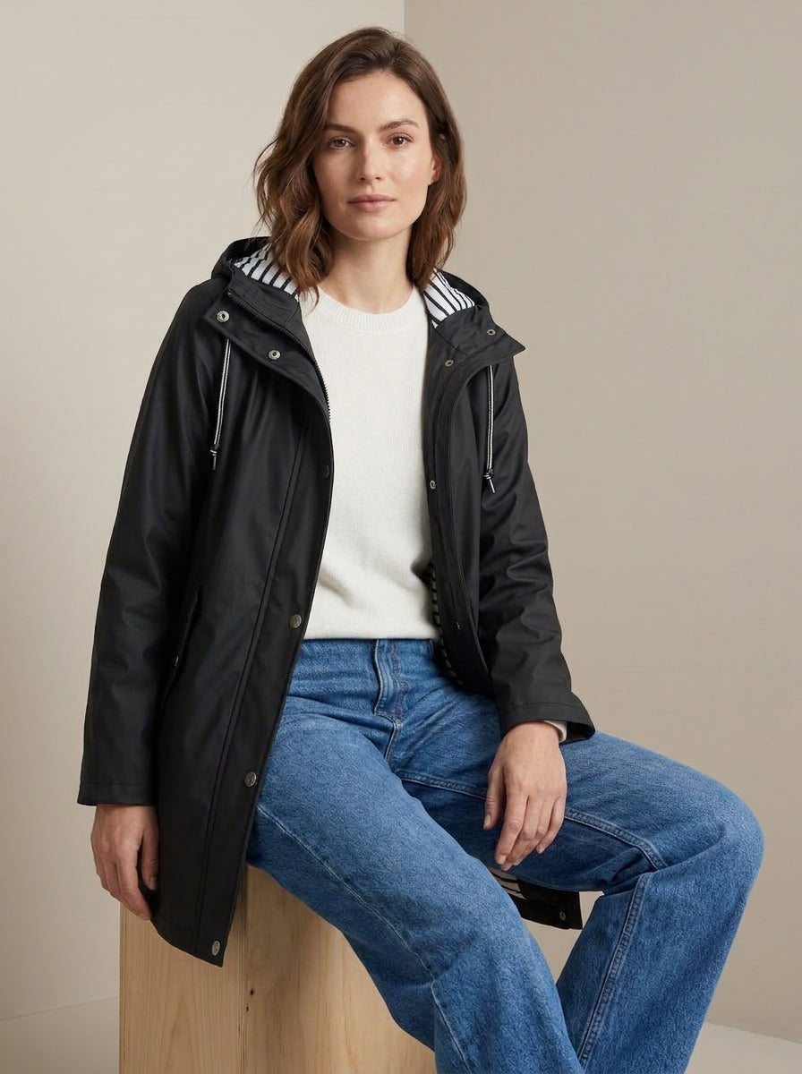dipni womens waterproof windproof hooded jacket row50 08 black seated on cube